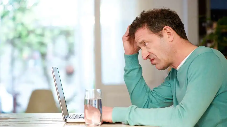 depressed-guy-in-front-of-a-laptop